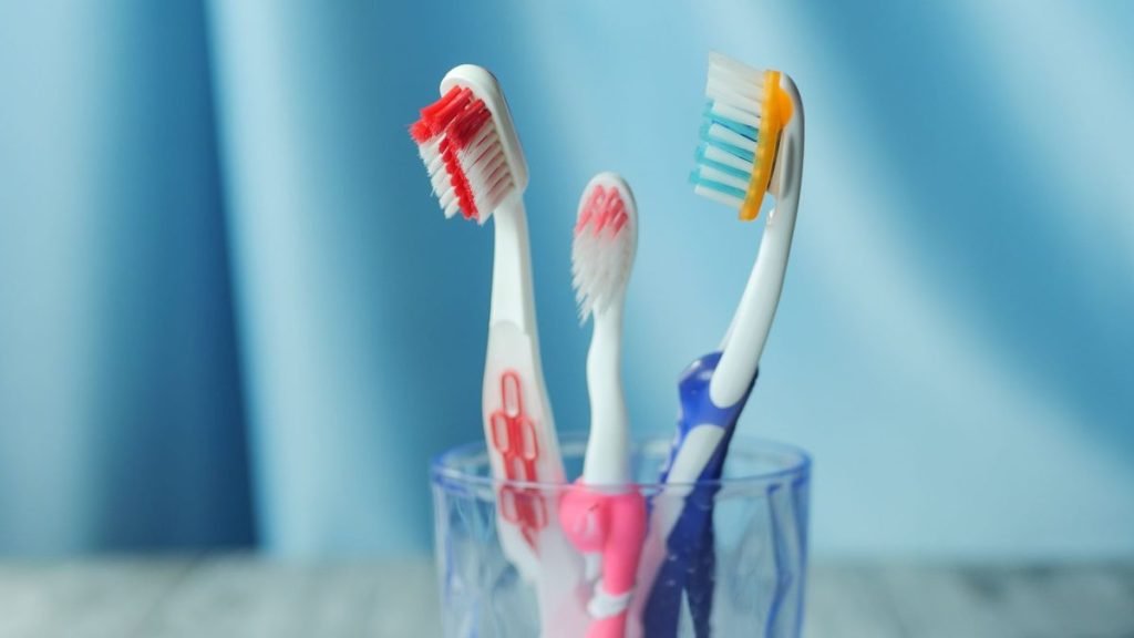 Toothbrushes in a glass